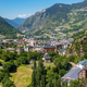 Principality of Andorra, view of the parish of Encamp, with Sant Roma de les Bons Church and the medieval Torre del Moros defense tower overlooking the village from the hillside.